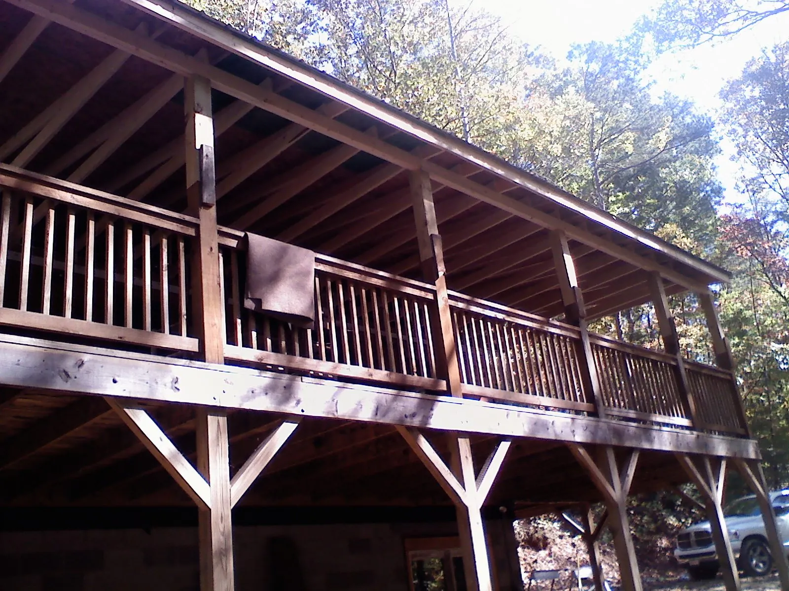 Timber framing under a new elevated porch and deck — Roof Leak Repair in Mission by Roofing Brothers